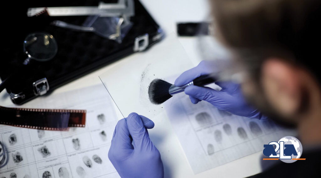 forensic scientist dusting for fingerprints in a laboratory setting